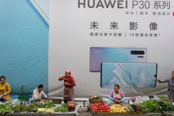 Huawei sees trouble ahead despite revenue rise